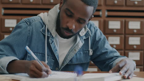 student studying in a library