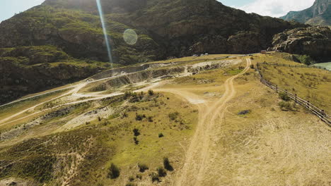 terrain with complex web of dirt trails fpv. perfect landscape for motocross training park with paths cutting through dusty earth against cliffs