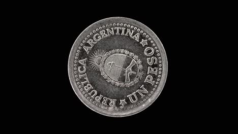 argentina 1960 1 peso coin obverse with national coat of arms and denomination rotating on black background
