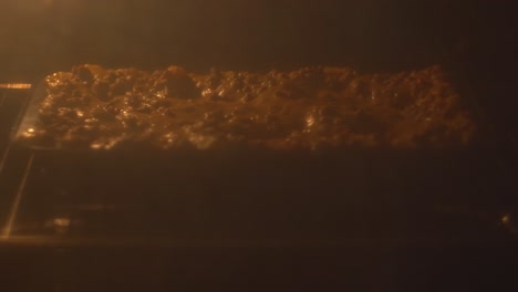 food timelapse of lasagne lasagna rising up 4k from the oven