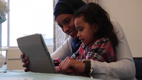 mother and daughter at home
