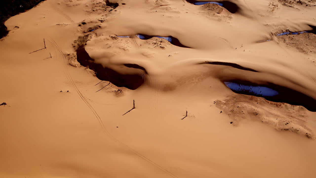 Drone captures a bird’s-eye perspective of the unique terrain in Utah’s Pink Sand Dunes.
