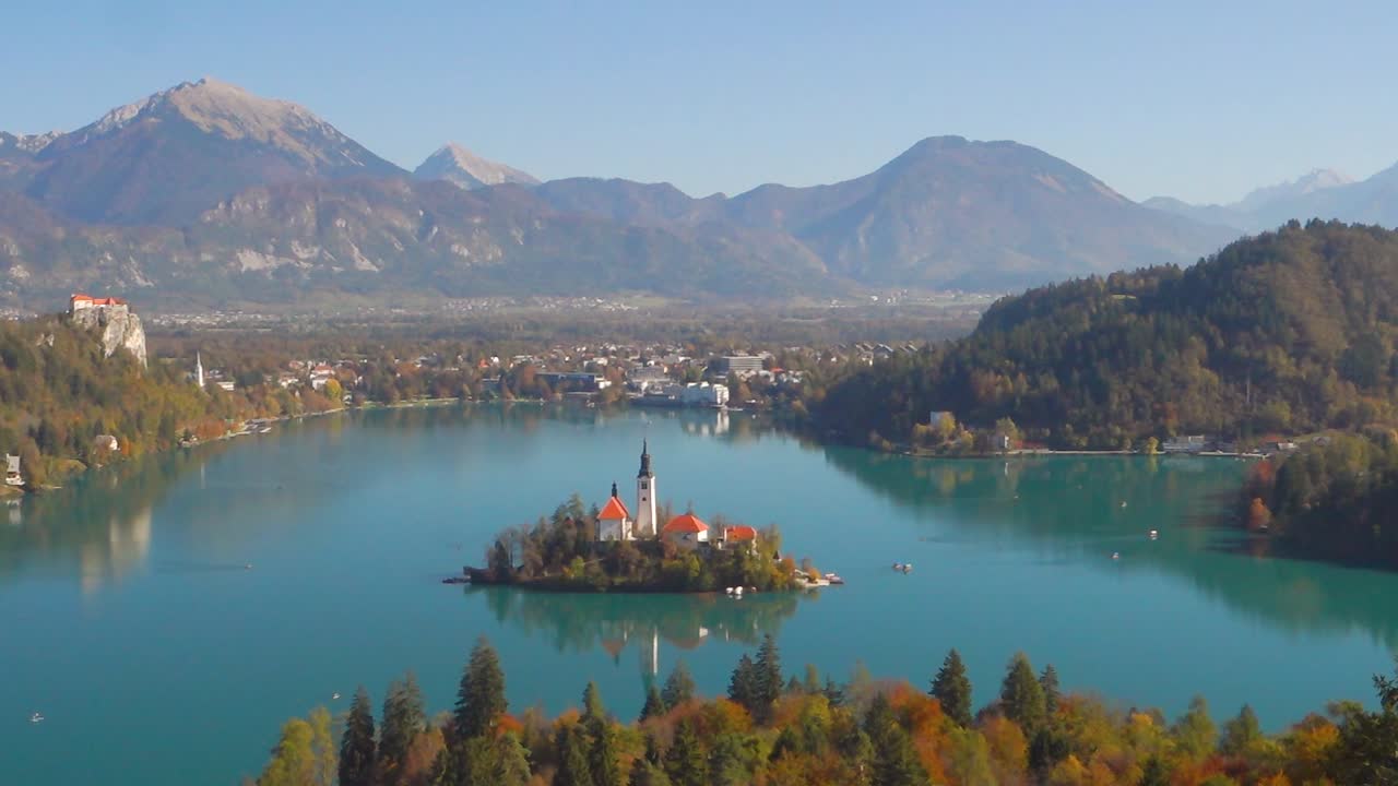 Lake Bled Slovenia. Beautiful mountain lake with small Pilgrimage Church. Most famous Slovenian lake and island Bled with Pilgrimage Church of the Assumption of Maria and Bled Castle