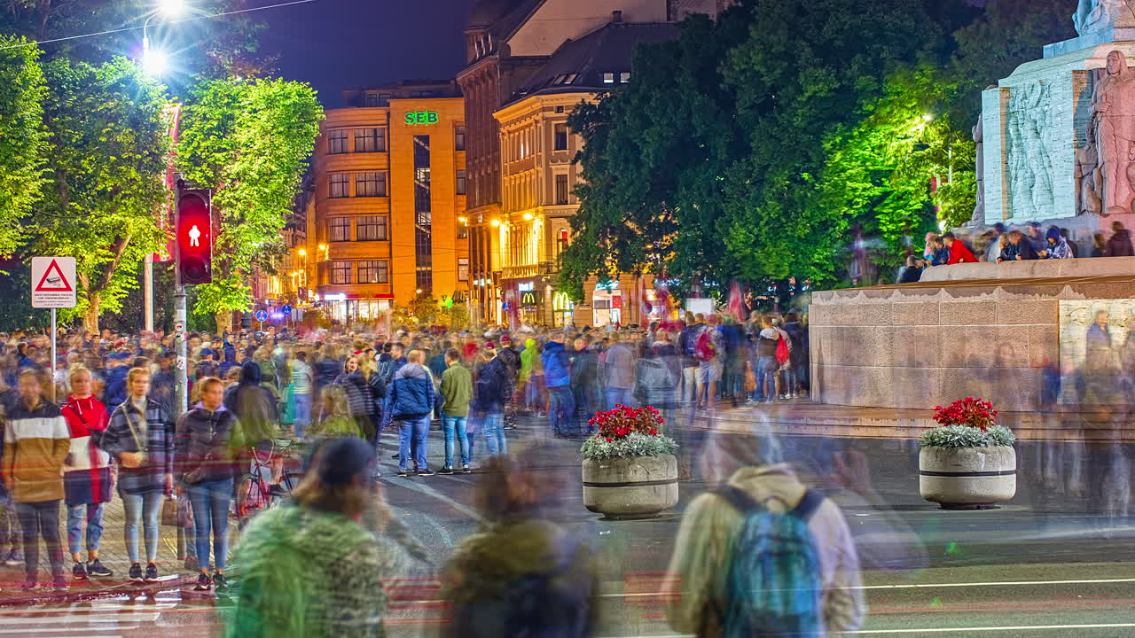 Anti-vaccination Protest Ongoing In The City Of Riga In Latvia. Thousands Of People Demonstrating At Night. time lapse
