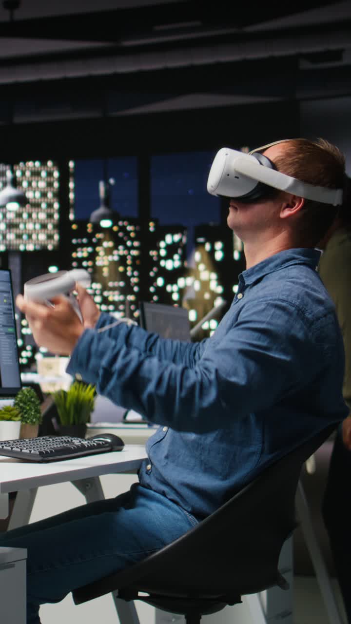 Vertical Video Professional male developer operating VR glasses to create spaceship station