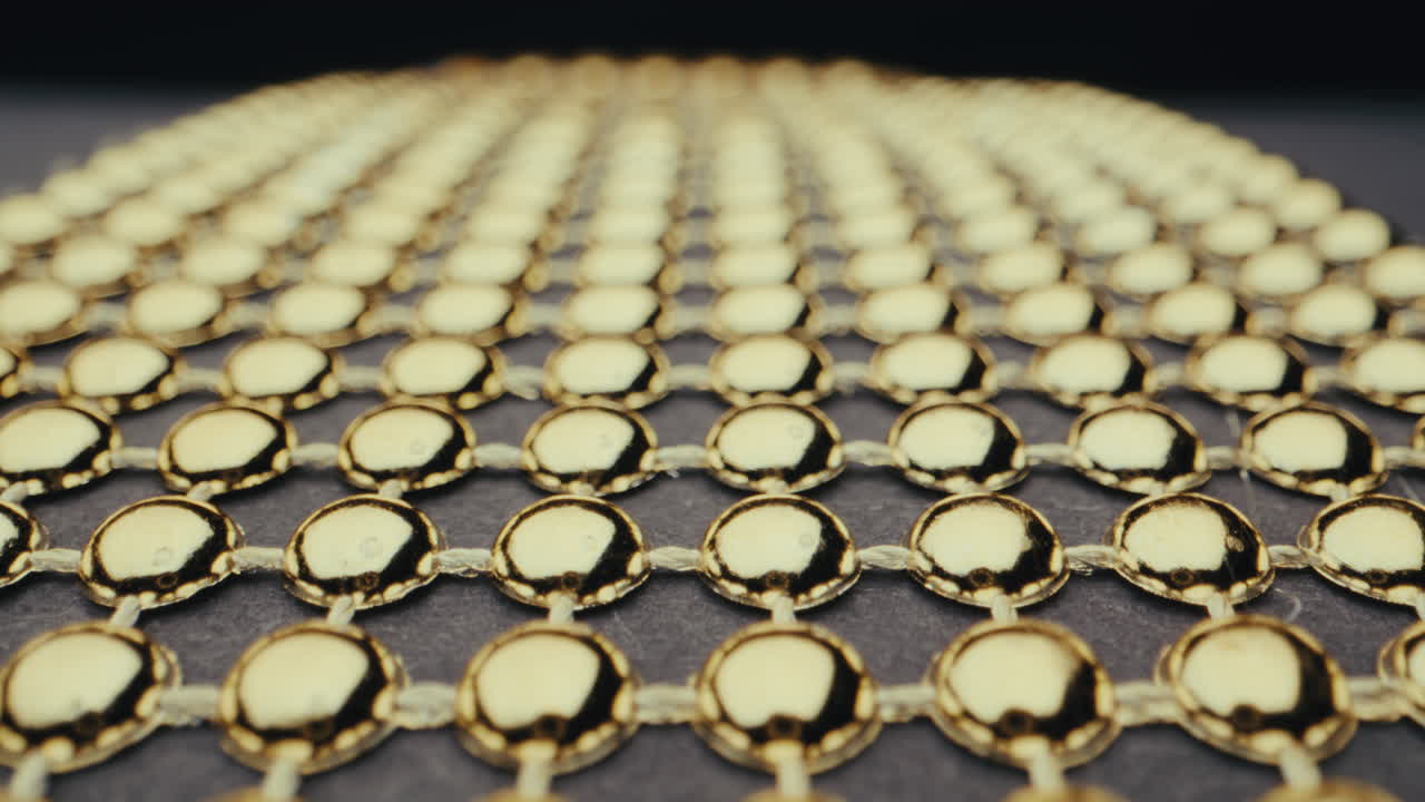 Close-up of a Gold Bead Grid Pattern