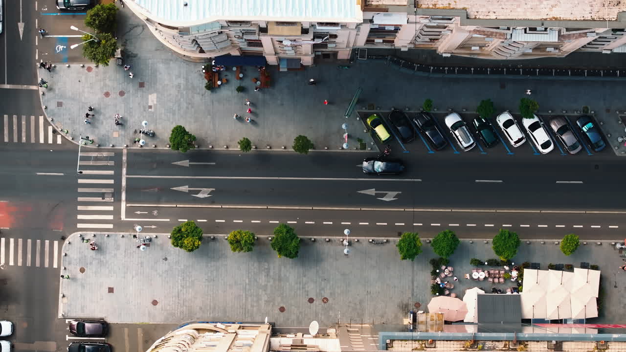 Aerial drone view of cars moving in traffic through Bucharest, Romania