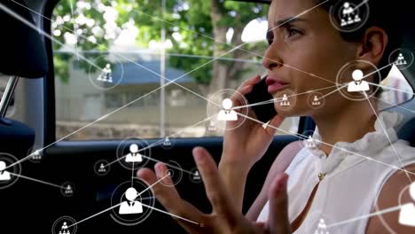 Animation-of-caucasian-businesswoman-talking-on-smartphone-over-network-of-connections-with-icons