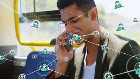 Animation-of-network-of-connections-over-biracial-businessman-talking-on-smartphone