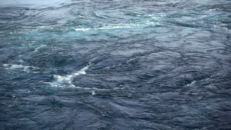 Waves-of-water-of-the-river-and-the-sea-meet-each-other-during-high-tide-and-low-tide.