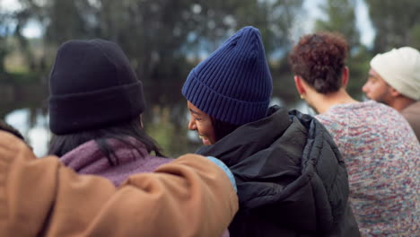 Friends,-laughing-and-group-by-lake-for-camping