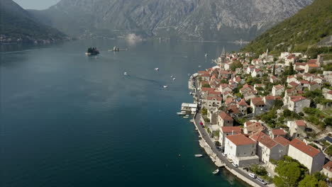 Aerial-shot-of-Perast-in-on-the-bay-of-Kotor-in-Montenegro-during-a-sunny-day