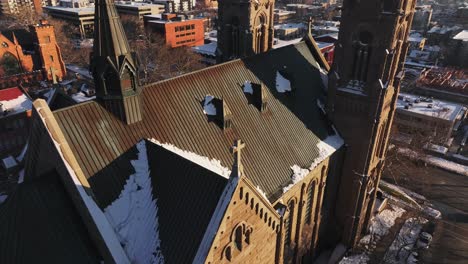 Lateral-Tilt-up-and-Reveal-Towards-Pinnacles-at-The-Cathedral-of-the-Madeleine-in-Downtown-Salt-Lake-City-Utah