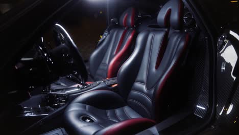 italian full carbon sport car seats detail in the dark