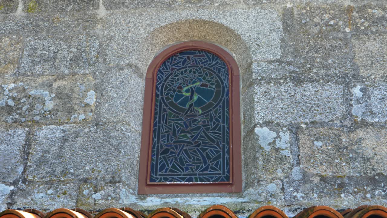 Window close-up of Santa María de Parada de Outeiro church in Vilar de Santos, Ourense, Galicia