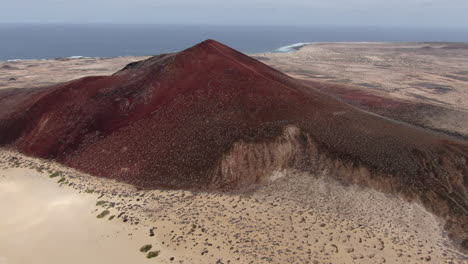 bermeja mountain, la graciosa island: aerial view in orbit to the bermeja mountain on a sunny day