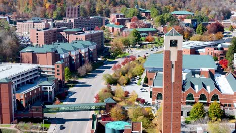 aerial push in to appalachian state university campus in autumn in boone nc, north carolina