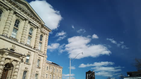 a slow panning shot revealing the majestic structure of the old don jail in toronto