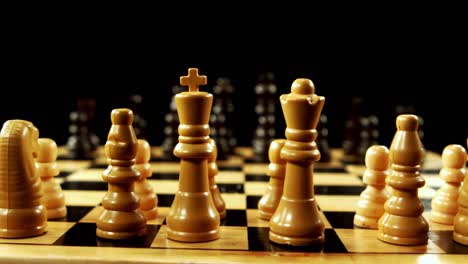 Chess-set-against-black-background