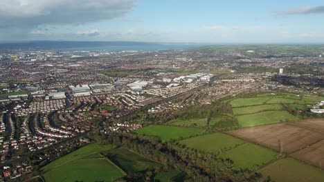 Aerial-flyover-of-east-Belfast-from-the-countryside-looking-towards-the-city-centre-or-center