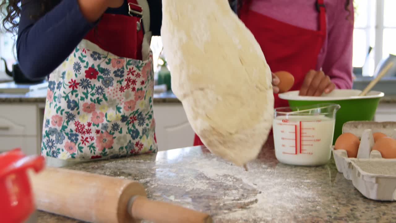 Family making Christmas cookies at home