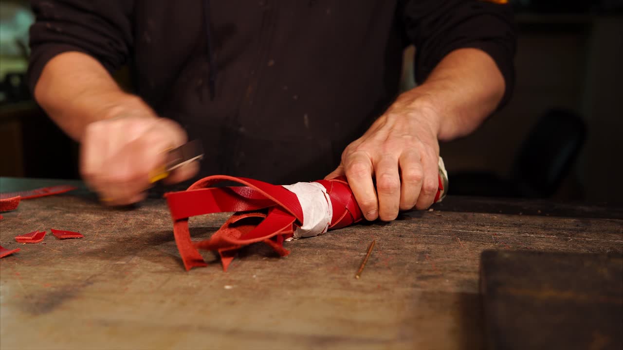 Leatherworker Shaping Red Leather