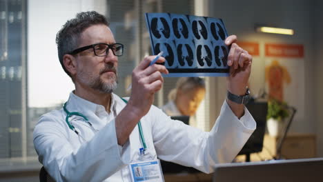 doctor reviewing x-ray images