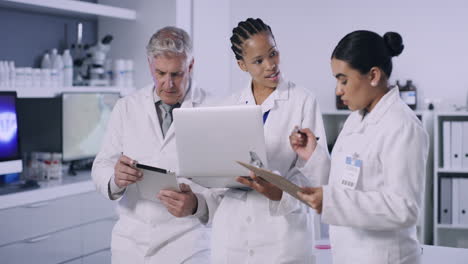 scientists discussing research in a laboratory