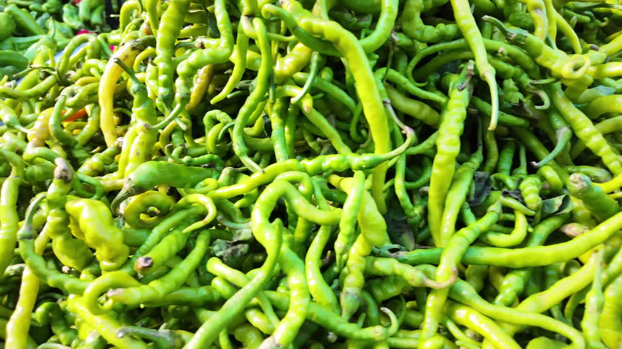 Close-up View of Fresh Green Chili Peppers