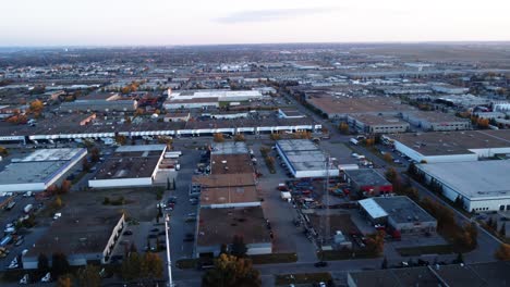 circular drone shot in calgary industrial zone at sunrise