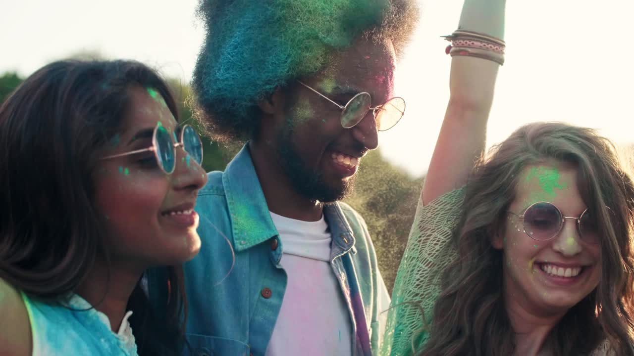 People dancing at the holi festival