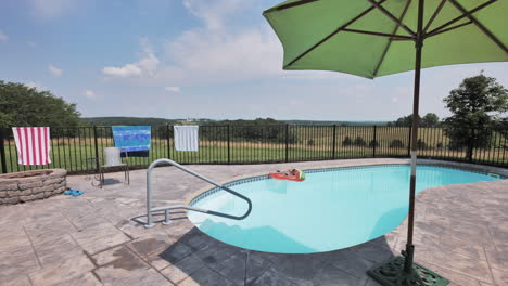 Static-shot-of-empty-relaxing-pool-on-sunny-day