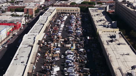 aerial view of a bustling outdoor market or distribution center