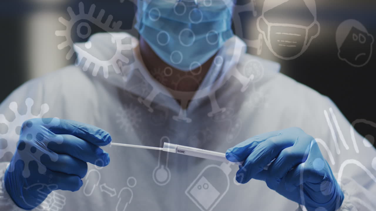 Animation of medical icons over caucasian male doctor wearing face mask