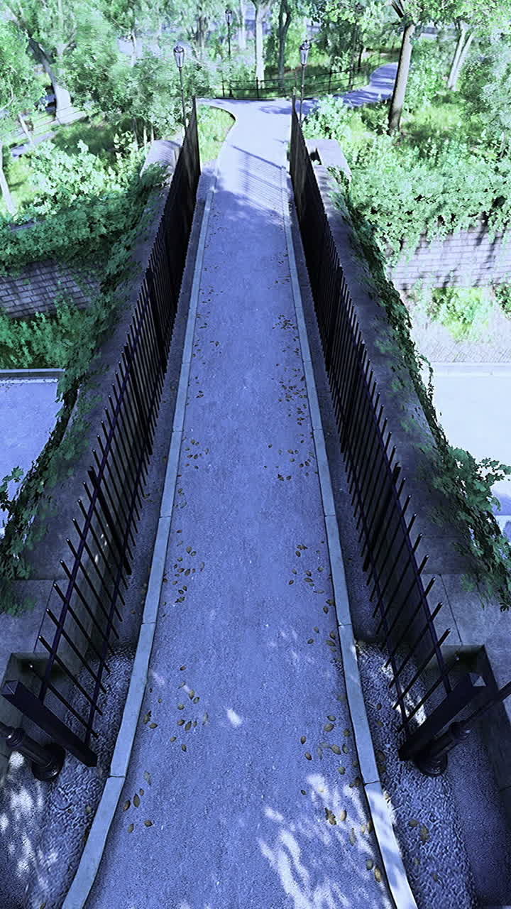 Elevated view of a peaceful green walkway surrounded by trees and roads