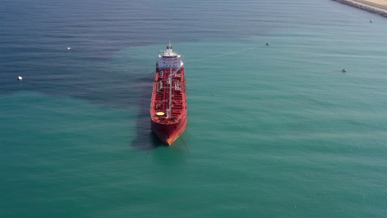 Oil spills out of a ship to the Sea- Aerial View