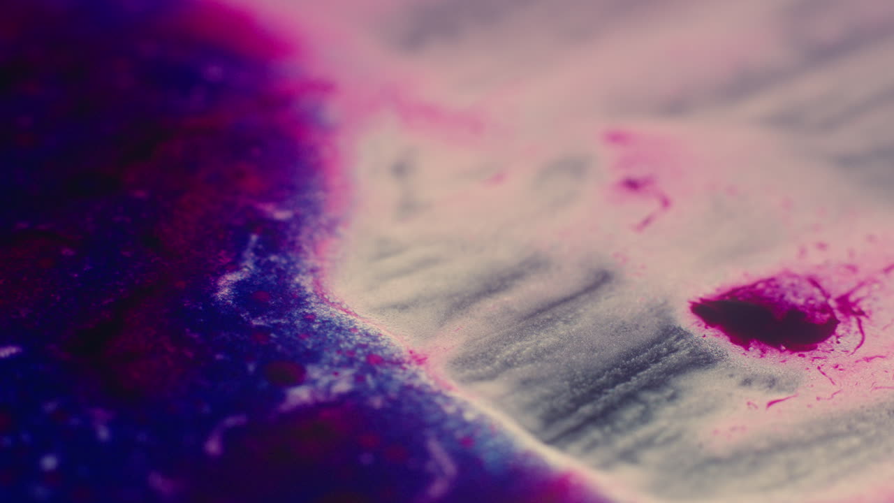 Colourful, organic, liquids macro shots buzzing and flowing