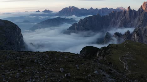 aerial of majestic tre cime di lavaredo mountains in italian alps