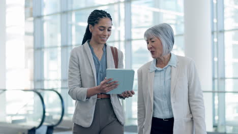 Travel,-tablet-and-business-people-in-an-airport