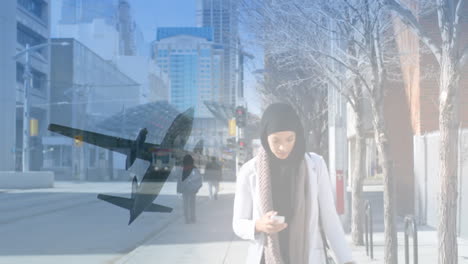 animation of asian woman in hijab walking with smartphone over cityscape