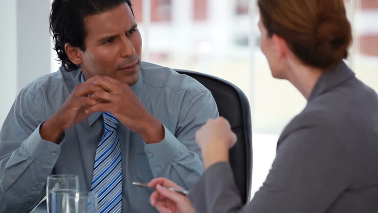 Businessman talking to his colleague