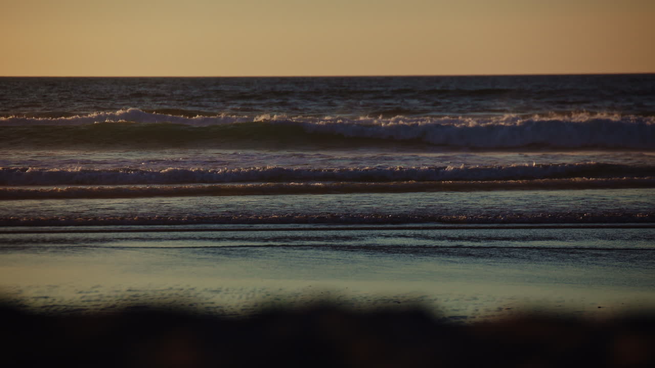 Vibrant Santa Cruz sunset with stunning ocean views, golden skies, and rolling waves—ideal for cinematic scenes, travel videos, or peaceful nature backgrounds.