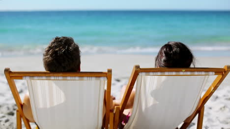 Relaxed-couple-looking-out-at-the-sea