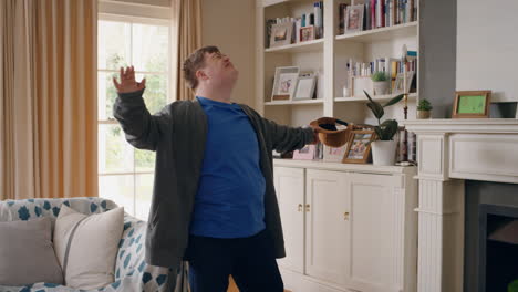 funny-teenager-boy-with-down-syndrome-dancing-in-living-room-special-needs-kid-having-fun-celebrating-with-silly-dance-moves-enjoying-happy-weekend-at-home-4k