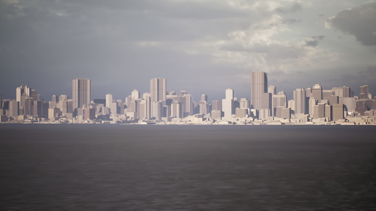 Urban skyline view over calm waters under a cloudy sky at dusk