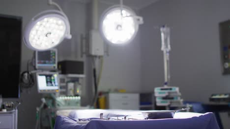 video of illuminated lights and electronic medical equipment in operating theatre, with copy space