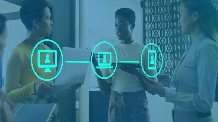 Animation of network of connections with icons over diverse colleagues discussing work in office