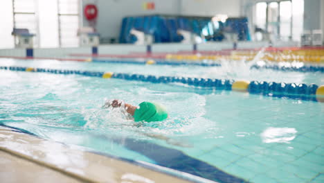 swimmer in indoor pool