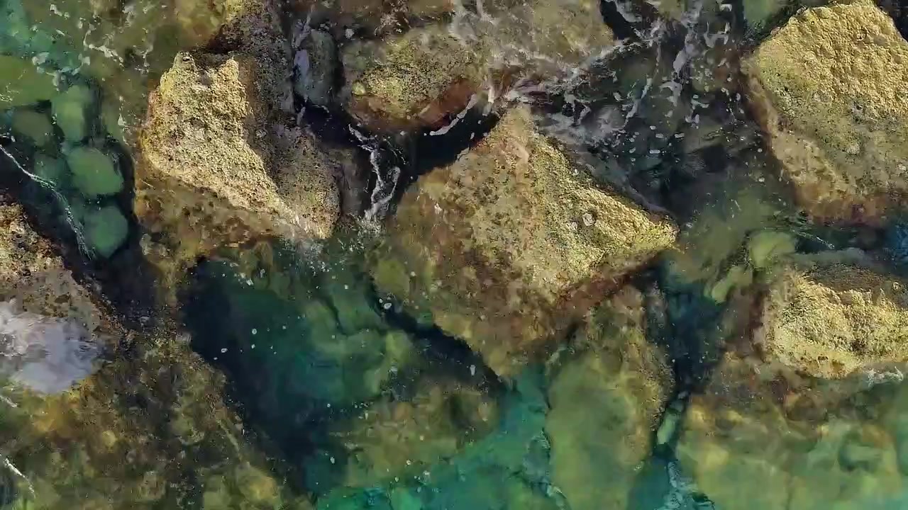 Exploring coastal rocks and water in Albania from above