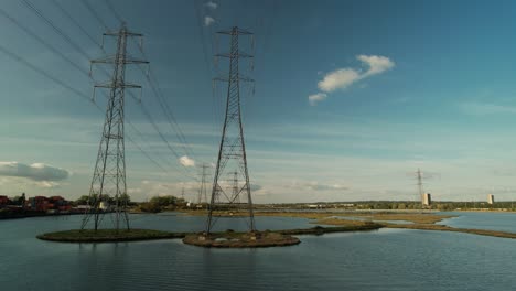 high voltage transmission towers supplying electricity to city of southampton in united kingdom